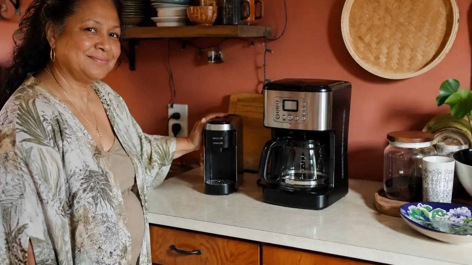 Keurig K-Mini next to a full-size drip coffee maker showing the size difference